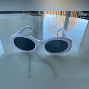 White Oval Sunglasses with Dark Lenses